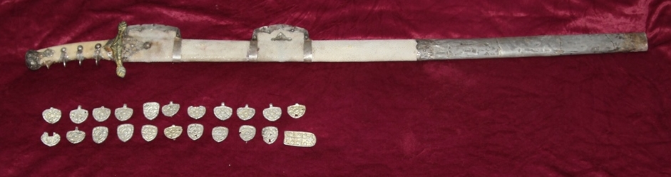 Sabre with plain silver fittings and romboid shape guard